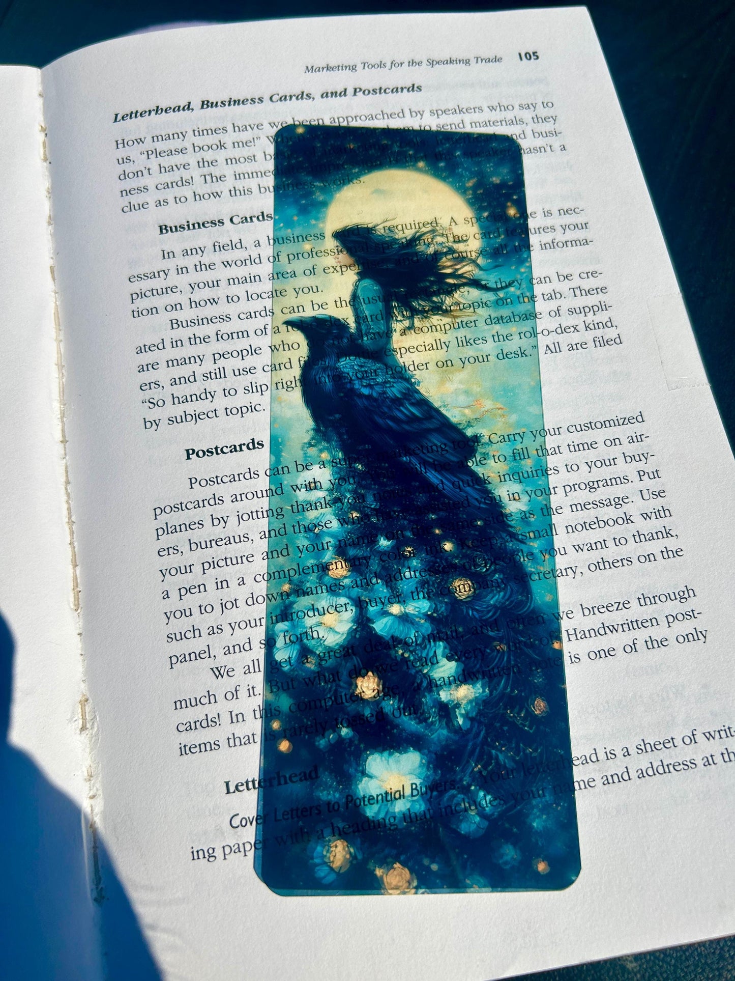 Raven Girl Bookmark – Moonlit Sky Illustration with Celestial Blue Flowers | Magical Animal Ride Fantasy Art