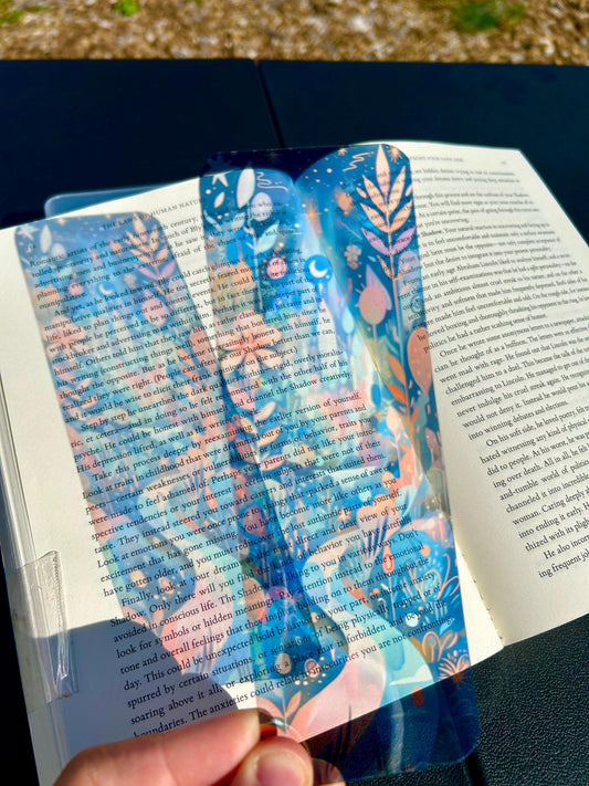 Starlit fantasy map bookmark with glowing moonlit path, enchanted castle, magical plants and dreamy night sky illustration for readers