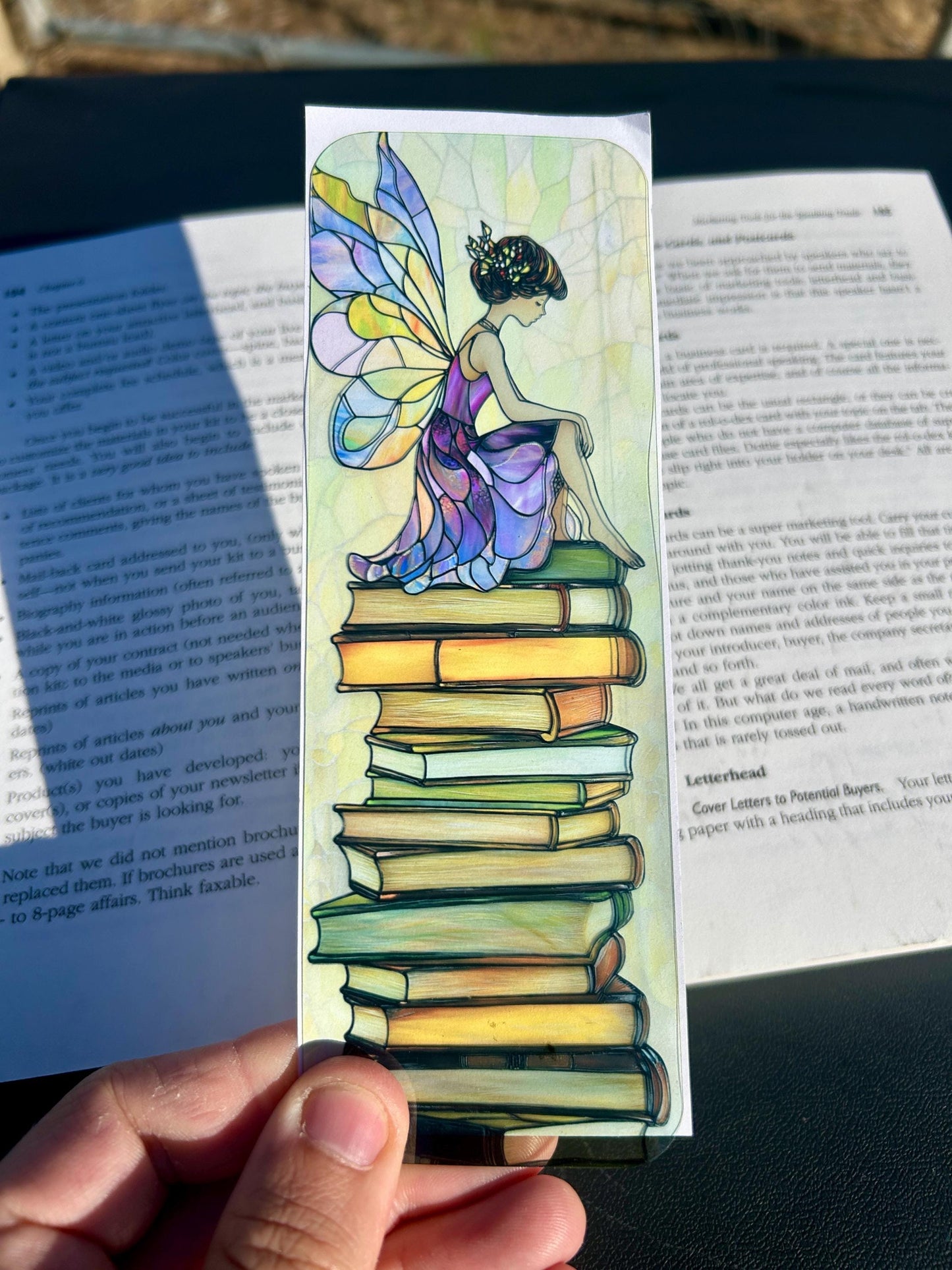Fairy on Storybook Stack Bookmark with Muted Purples and Stained Glass Wings – Soft Fantasy Art for Thoughtful Readers, Fairy Lovers