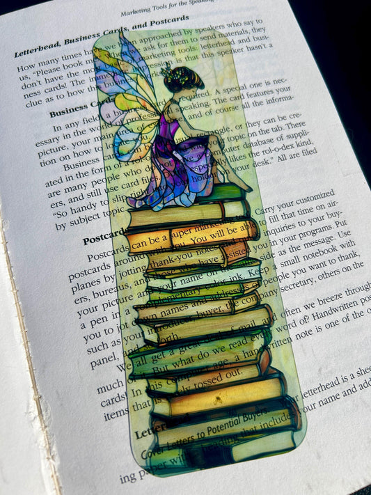Fairy on Storybook Stack Bookmark with Muted Purples and Stained Glass Wings – Soft Fantasy Art for Thoughtful Readers, Fairy Lovers
