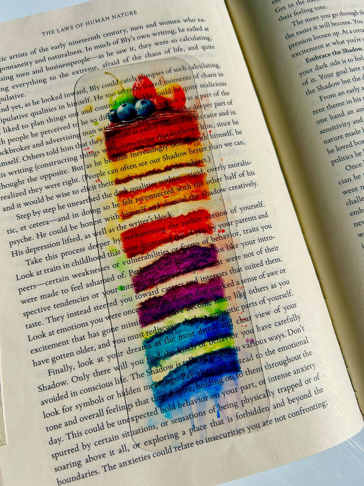 Rainbow cake watercolor bookmark with fruit topping, vibrant dessert-themed art print in impressionist painting style