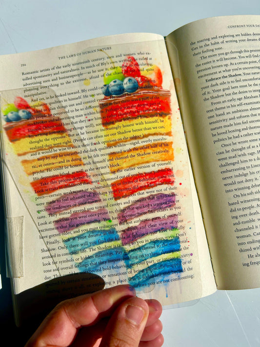 Rainbow cake watercolor bookmark with fruit topping, vibrant dessert-themed art print in impressionist painting style