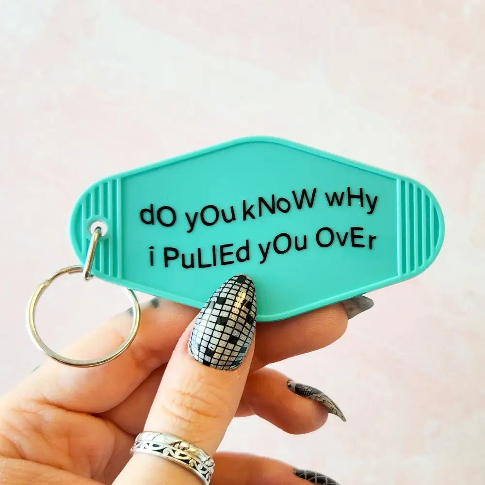 Do you know why I pulled you over? Motel Keychain Blue Keychain