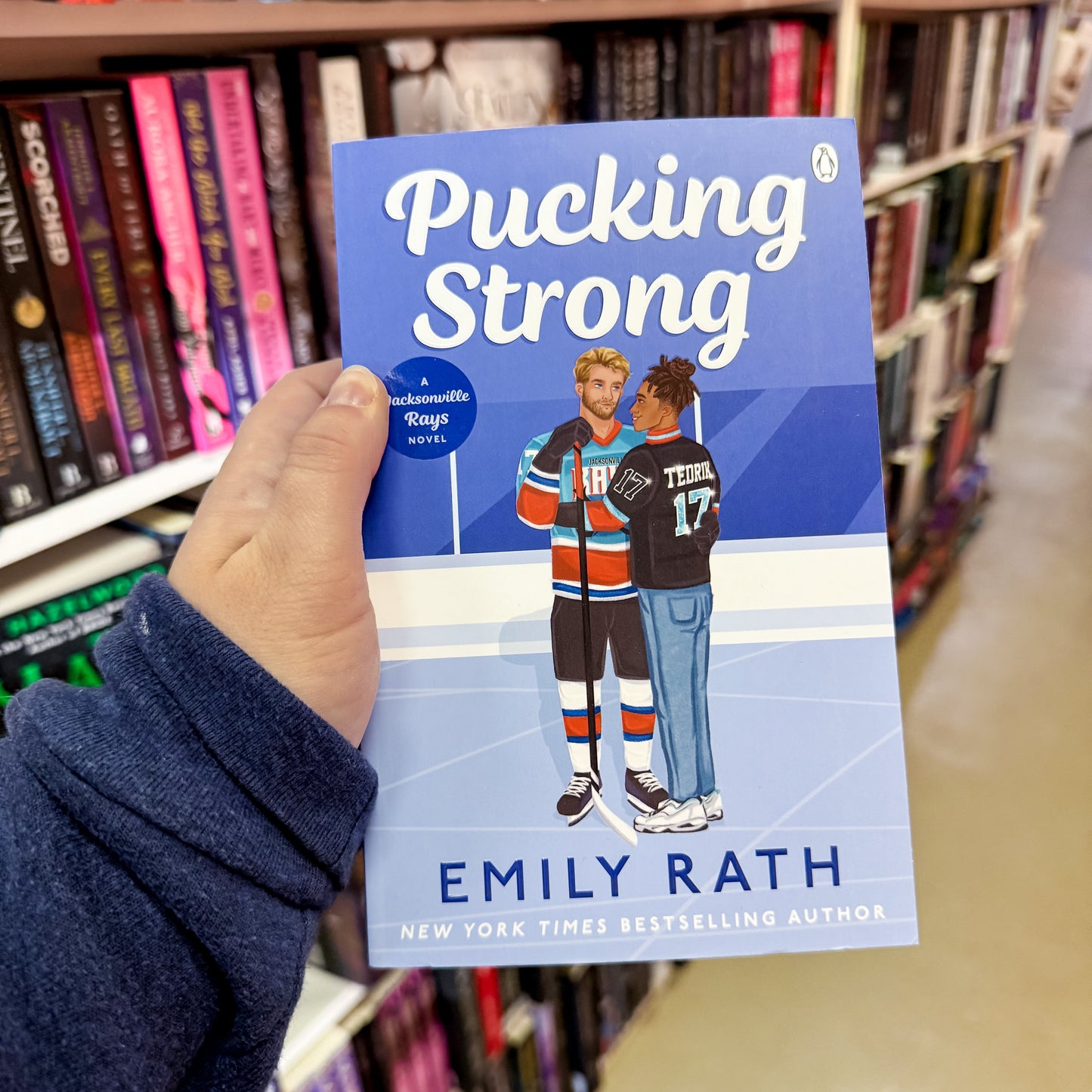 Pucking Strong: The brand new steamy sports romance in the international bestselling BookTok ice hockey series by Emily Rath (UK Cover)