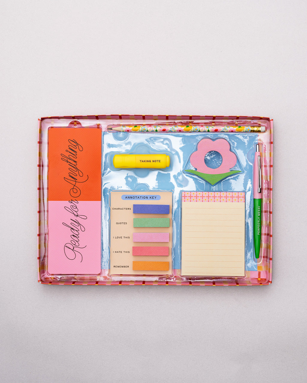 packaged reading kit with 5 sticky flags (75 sheets each), mini highlighter, sticky notepad (75 sheets), book holder, bookmark, pencil, pen